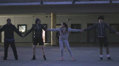 Salma and her friends during outdoor training at the Brussels Boxing Academy (BBA) in Molenbeek. [Screenshot/Al Jazeera]