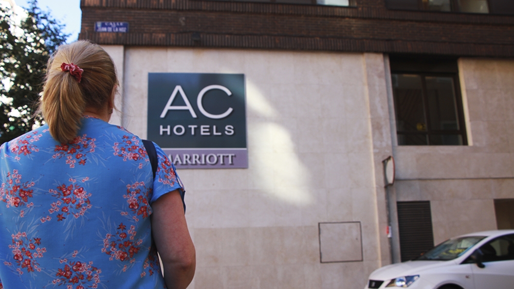 Maria* is 44 years old and has suffered severe pain because of the long hours cleaning hotel rooms [Santiago Saez/Al Jazeera]