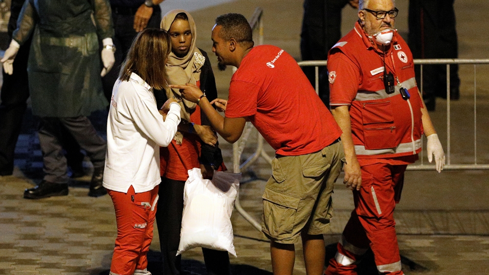 Twenty-nine unaccompanied children were allowed to disembark on the night of August 22 [Antonio Parrinello/Reuters]