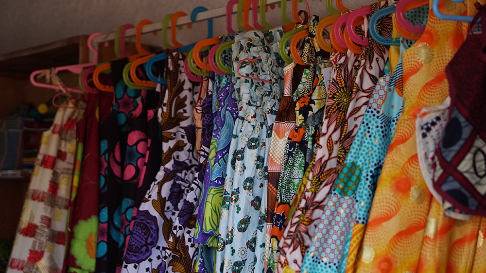 Women at the NWC cooperative manufacture clothes, accessories and homeware   [Azad Essa/Al Jazeera]