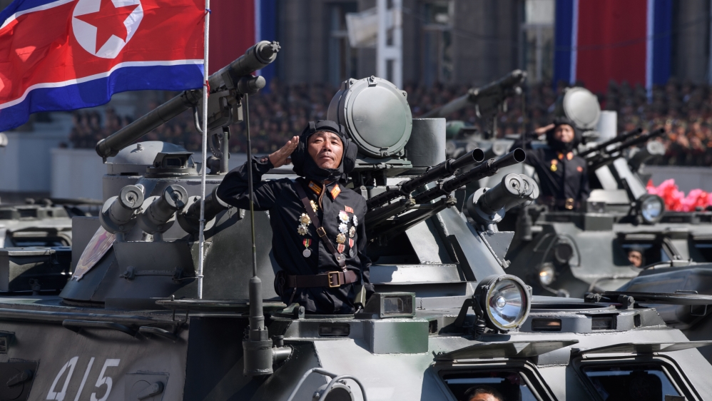 The parade featured armoured personnel carriers, multiple rocket launchers and tanks [Ed Jones/AFP]