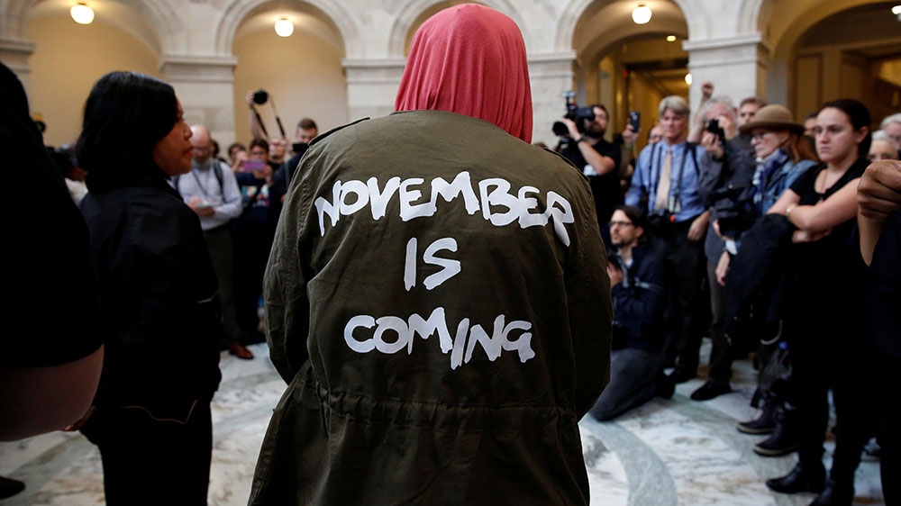 Hundreds of women were arrested during the protests against Kavanaugh [File: Joshua Roberts/Reuters]