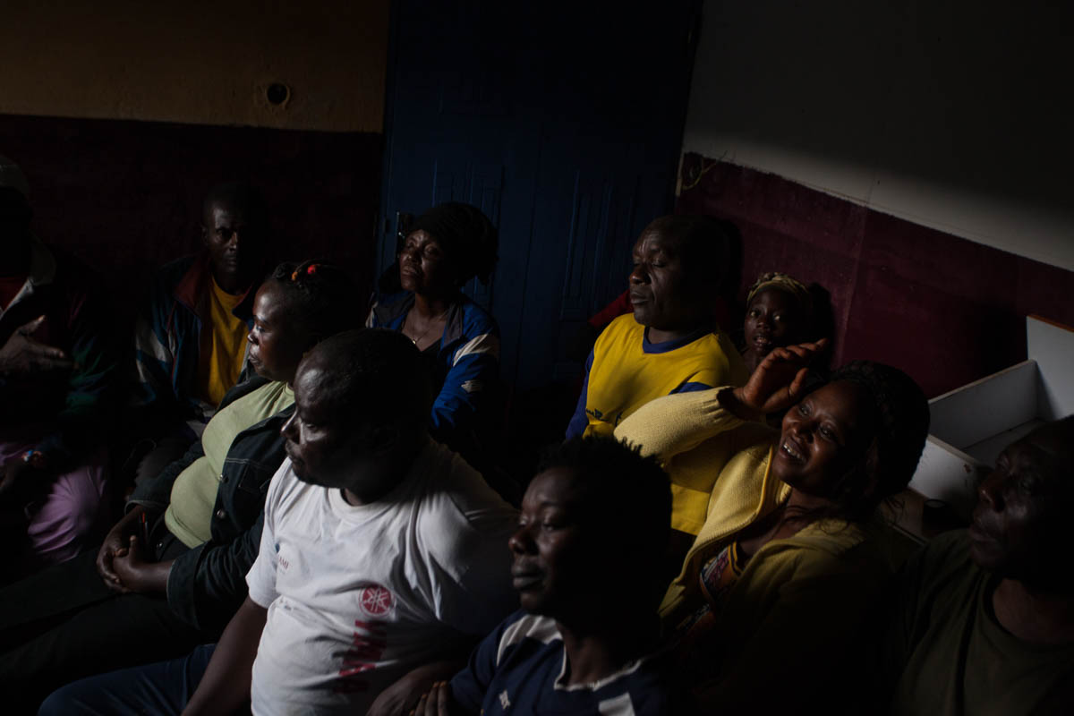 Adele, who accompanies her mother to the Wound Hospital, raises her hand to ask a question during the first aid and hygiene training given to patients every Thursday. Discussions come alive when the s