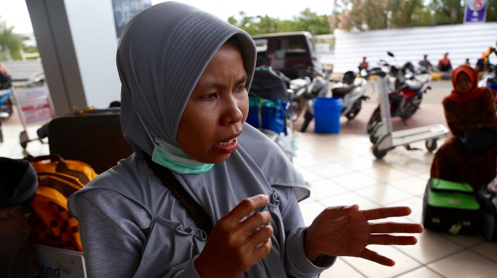 Herne managed to hold on to her mother and survive the raging tsunami waters [Ted Regencia/Al Jazeera] 