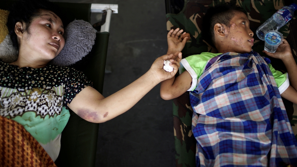 Victims of earthquake and tsunami are being evacuated from Palu airport [Athit Perawongmetha]