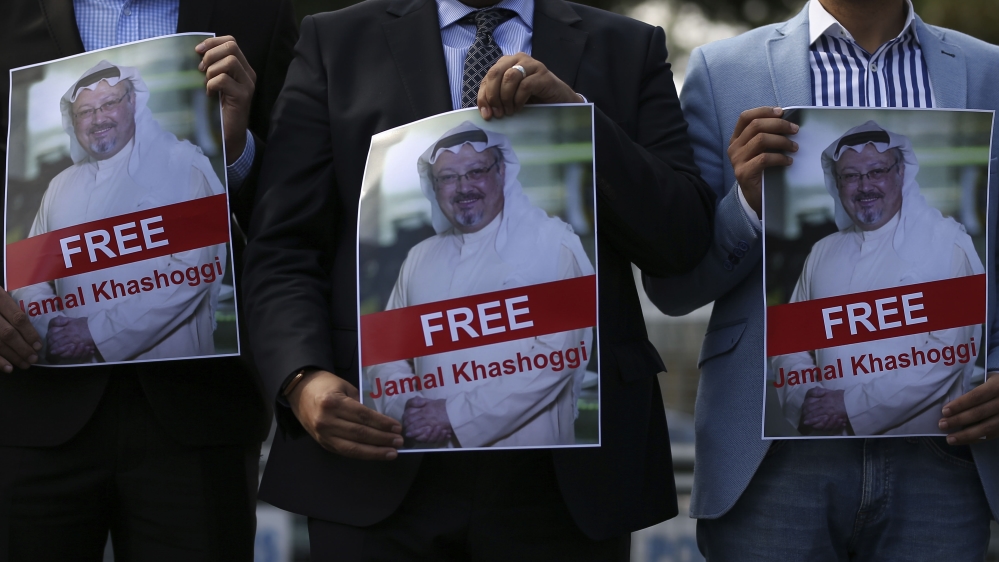 Holding pictures of missing Saudi writer Jamal Khashoggi, people gather in his support, near the Saudi Arabia consulate in Istanbul, Friday, Oct. 5, 2018. Khashoggi, a 59-year-old veteran journalist w