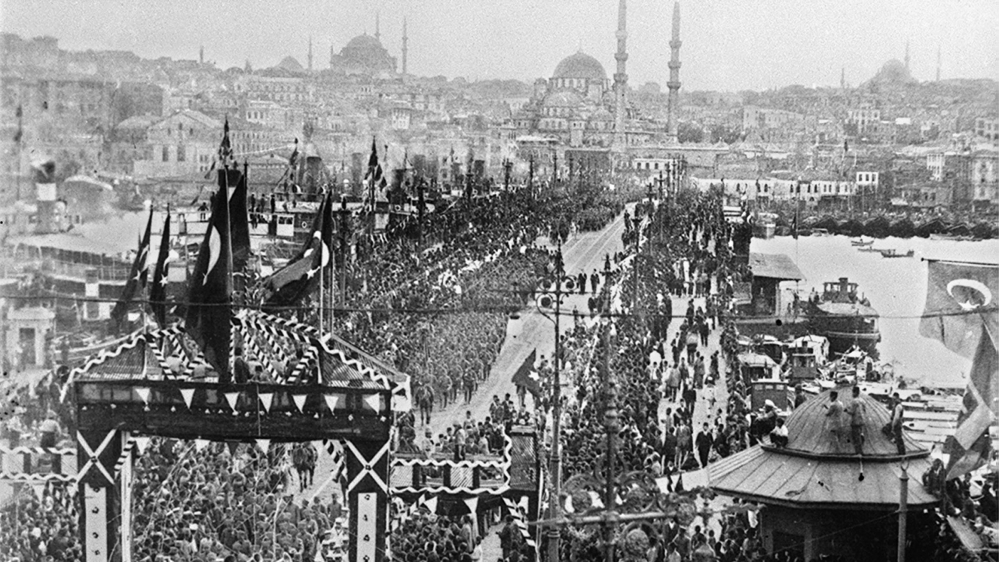 Turkish troops of the Iron Division march across the Galata Bridge into Constantinople, Turkey, in October 1923 to mark the end of its occupation by foreign allies [AP Photo]