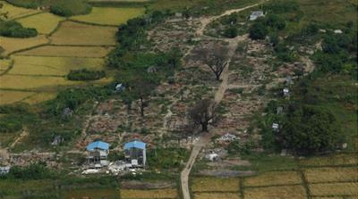 An aerial view of a burned Rohingya village near Maungdaw in Myanmar's northern Rakhine state in November 2017 [Wa Lone/Reuters]