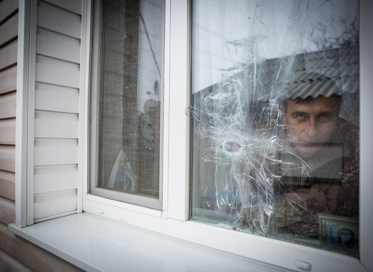 “I missed my home”. Mr. Polieshko decided to return to his village located by the contact line after some time in Russia despite damages to his house, loss of income and frequent shelling. Photo: Inge