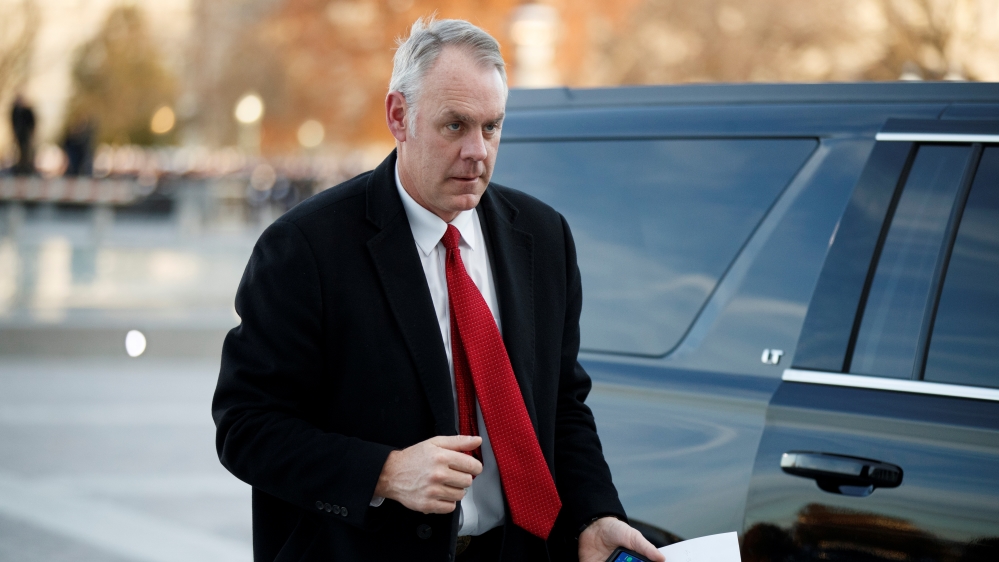 US Secretary of the Interior Ryan Zinke arrives at the US Capitol prior to the service for former President George H. W. Bush in Washington, DC, USA
