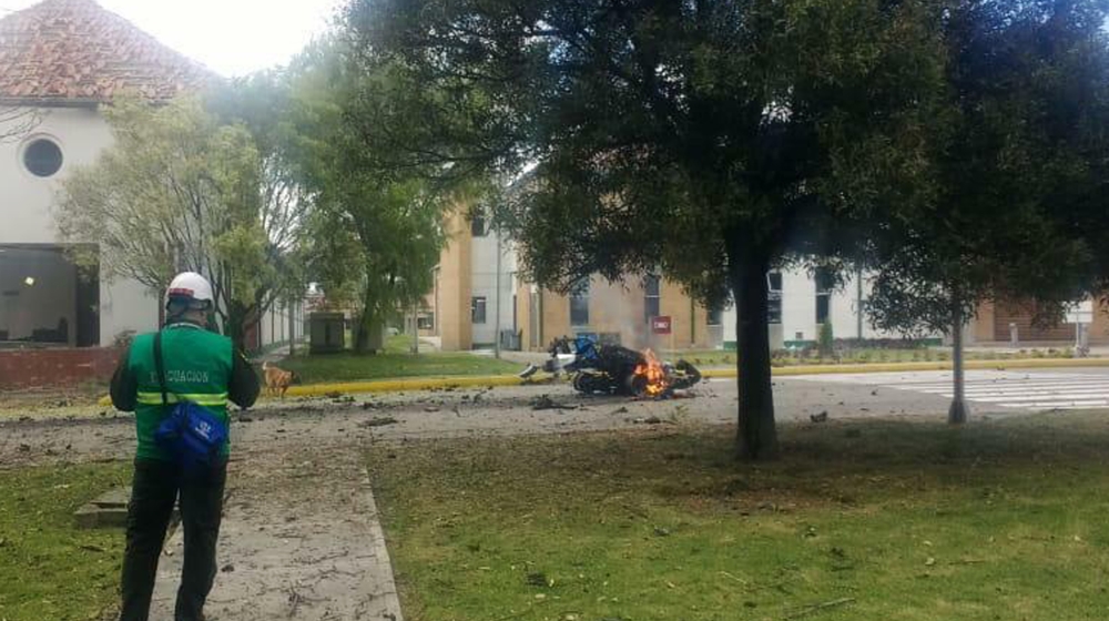 In this image provided by military personnel, flames rise from a deadly car bombing at a police academy on Thursday [Handout/AP Photo]