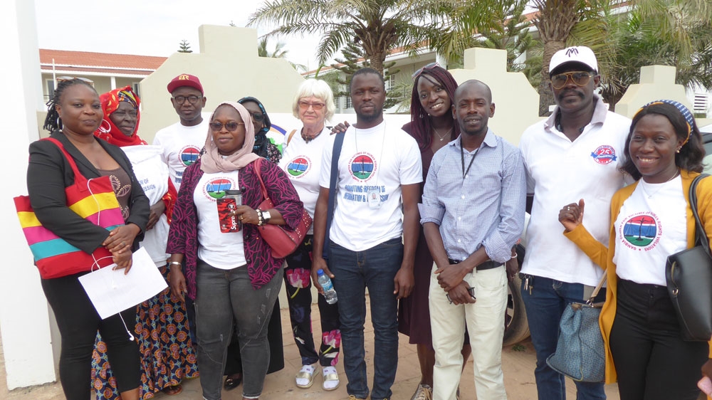 Survivors and victims' families from the Gambia Center for Victims of Human Rights Violations [Amandla Thomas-Johnson/Al Jazeera]