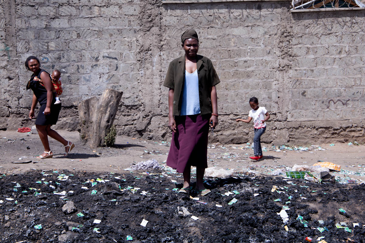 Syshia stands at her makeshift restaurant which was burnt down months after quitting. The mother of three ‘she saw a niche and opened up a makeshift restaurant next to the dumpsite to sell food mainly