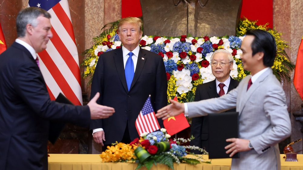 The two leaders preside over the signing of airline industry deals [Luong Thai Linh/Pool via Reuters]