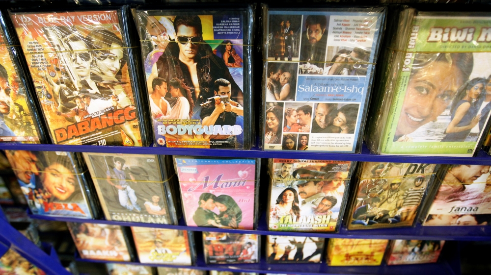 Bollywood movies are seen on display at a video store in Islamabad