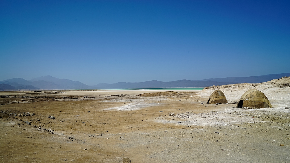 
Hummad Musa's house is made of chicken wire and corrugated iron. It neither keeps the wind or the heat out [Faisal Edroos/Al Jazeera]
