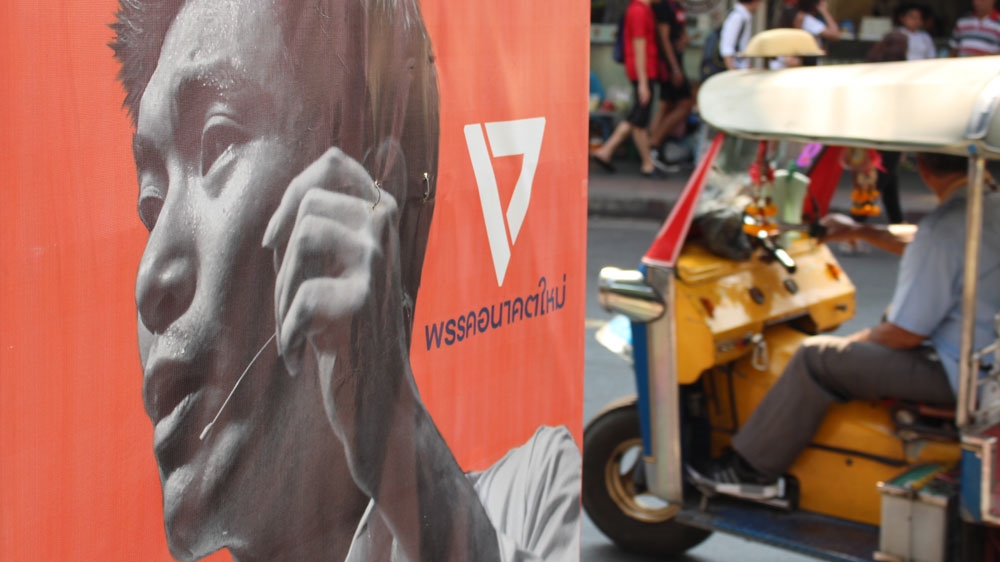 A campaign banner for Thanathorn on a Bangkok street corner [Kate Mayberry/Al Jazeera]