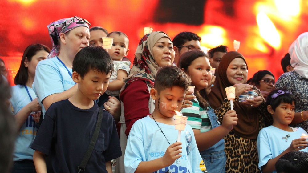 Families of the 239 people onboard MH370 when it went missing remember their loved ones at a memorial event in Kuala Lumpur [Al Jazeera/Kate Mayberry]