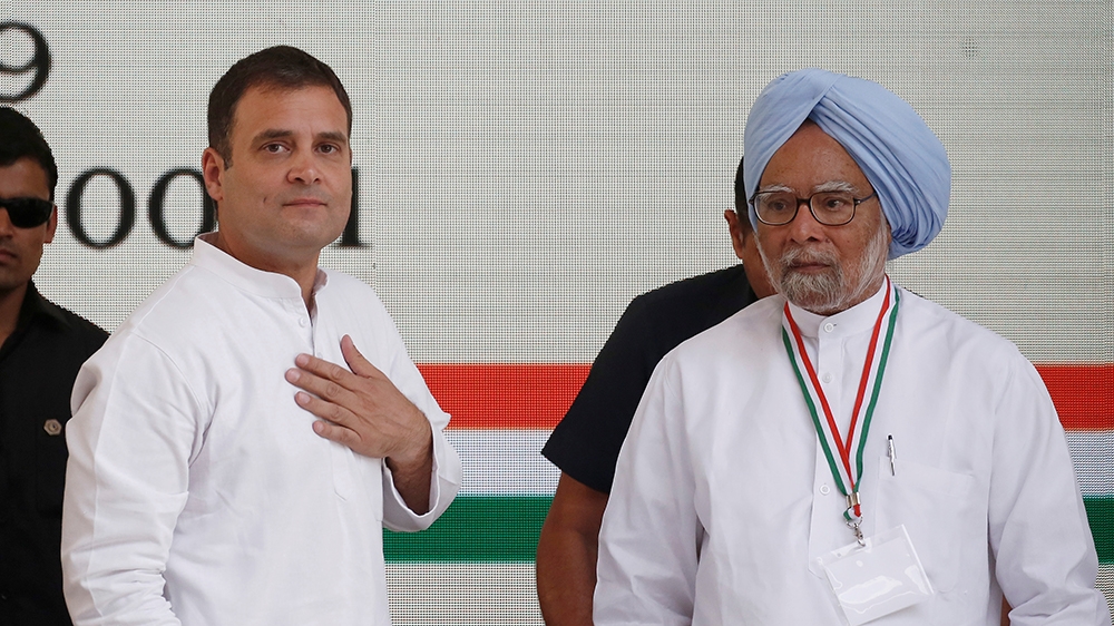 Rahul Gandhi, President of India''s main opposition Congress party, and India''s former Prime Minister Manmohan Singh leave after releasing their party''s election manifesto for the April/May general ele