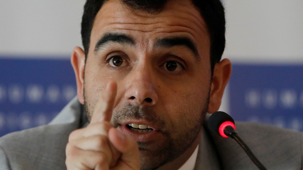 Omar Shakir, Israel and Palestine Director at Human Rights Watch, gestures during a news conference in Ramallah, in the occupied West Bank
