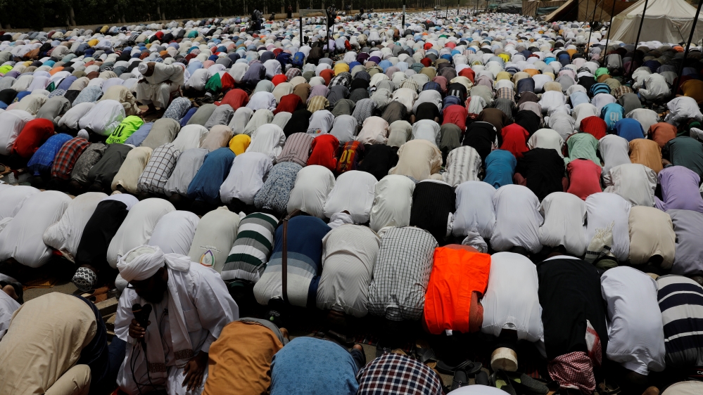 Protesters attend a friday prayers in front of the Defence Ministry in Khartoum [Umit Bektas/Reuters]