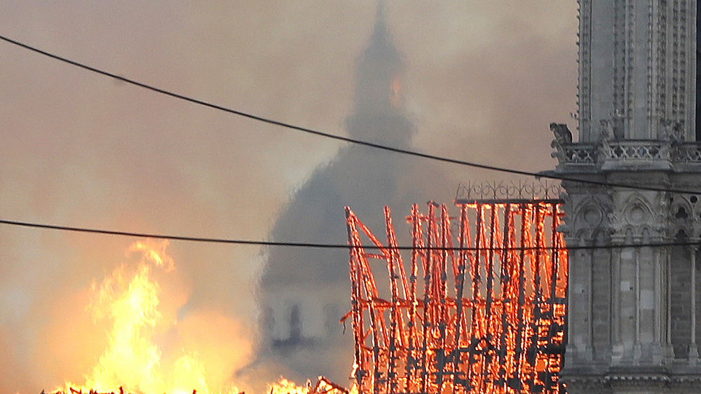 Flames rise from Notre Dame cathedral in central Paris[Thibault Camus/AP Photo]