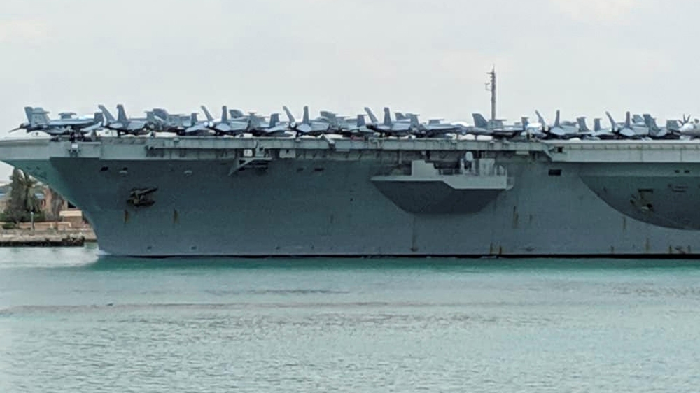 The USS Abraham Lincoln was pictured while travelling through the Suez Canal on May 9 [Bud Kinsey/via Reuters]