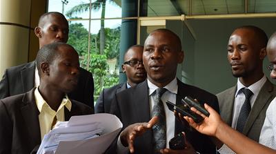 Peter Arinaitwe, lawyer for the Uganda Journalists Association, addresses journalists [Lydia Namubiru/Al Jazeera]