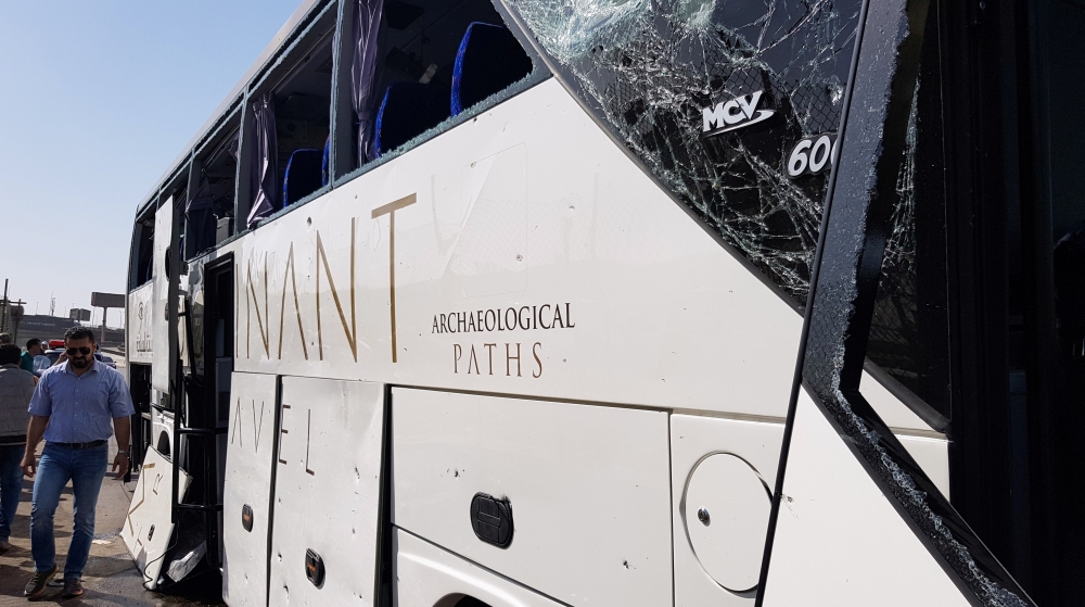A damaged bus is seen at the site of a blast near a new museum being built close to the Giza pyramids in Cairo, Egypt May 19, 2019.