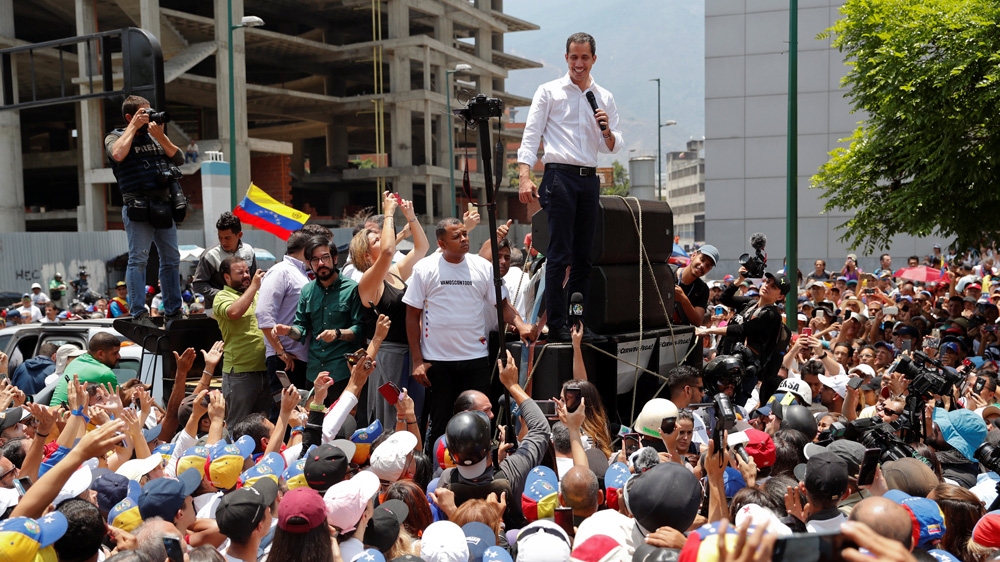 Guaido speaks to supporters during a rally against the government [Carlos Garcia Rawlins/Reuters]
