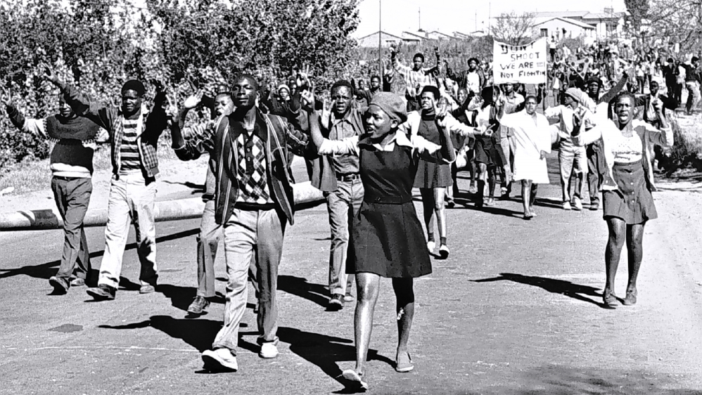 Students protest for better education before police fire tear gas and bullets into crowds, leading to the Soweto Uprising in 1976 [File: Bongani Mnguni/City Press/Gallo Images/Getty Images]