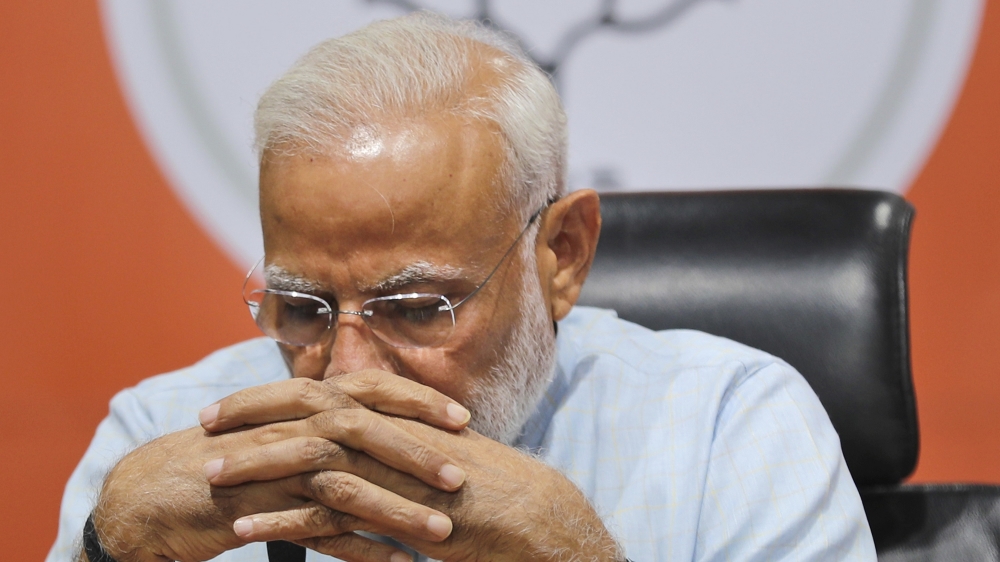 Indian Prime Minister Narendra Modi attends a press conference at the party headquarters in New Delhi, India, Friday, May 17, 2019