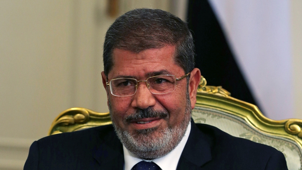 FILE PHOTO: Egypt''s President Mursi participates in a meeting with U.S. Defense Secretary Panetta at the presidential palace in Cairo