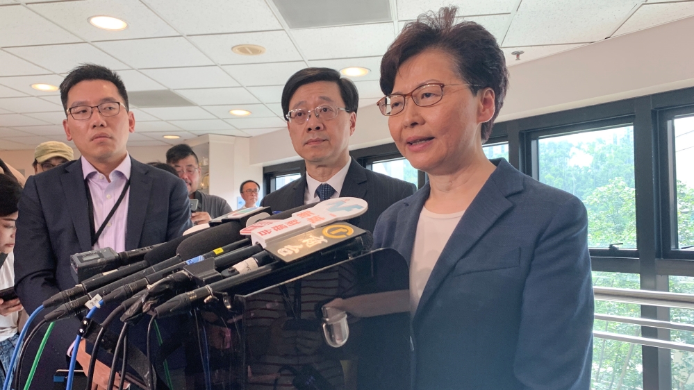 Hong Kong Chief Executive Carrie Lam (R) and Secretary for Security John Lee Ka-chiu speak to media over an extradition bill protest in Hong Kong, China July 15, 2019. REUTERS/Joyce Zhou