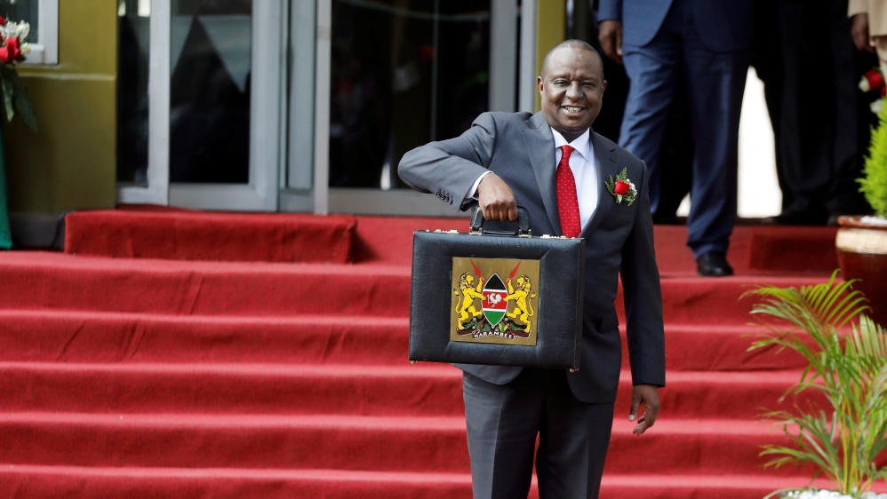 Kenya''s Cabinet Secretary of National Treasury Henry Rotich holds up a briefcase containing the Government Budget for the 2019/20 fiscal year in Nairobi