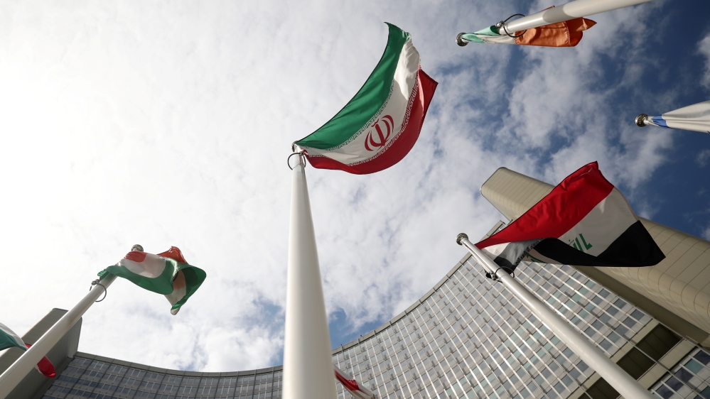 The Iranian flag flutters in front the International Atomic Energy Agency headquarters in Vienna