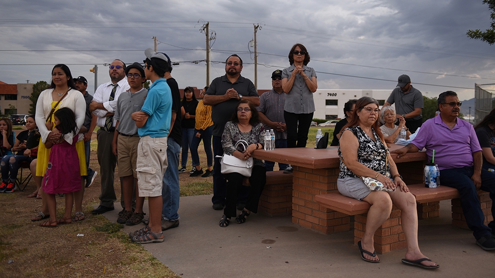 People gather for a vigil a day after a mass shooting at a Walmart store in El Paso, Texas, U.S. August 4, 2019. REUTERS/Callaghan O''Hare
