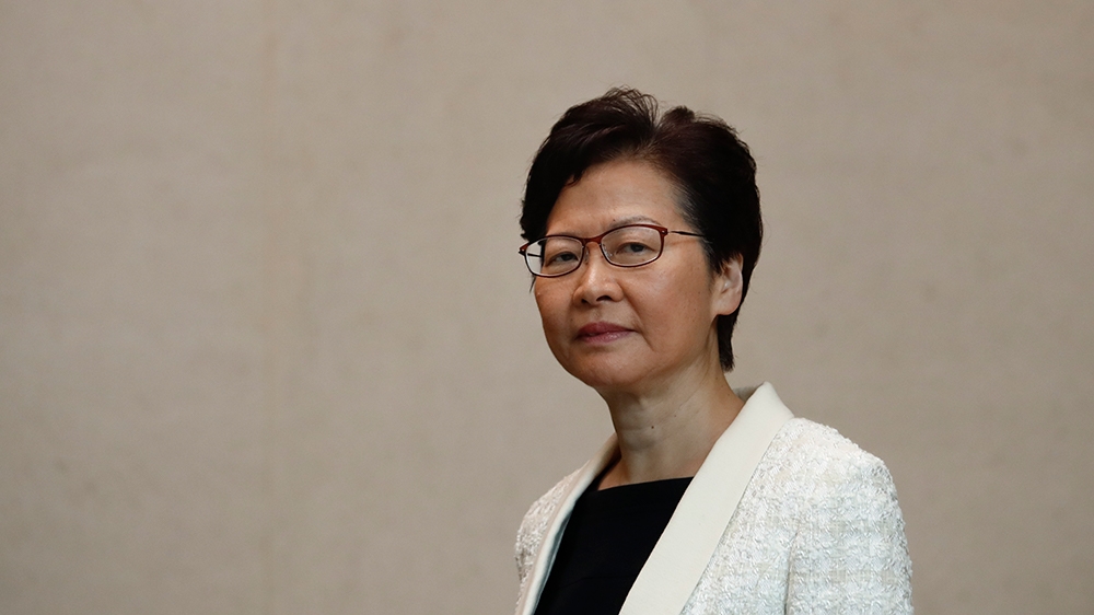Hong Kong Chief Executive Carrie Lam arrives for a news conference in Hong Kong on Tuesday, Sept. 3, 2019. (AP Photo/Jae C. Hong)