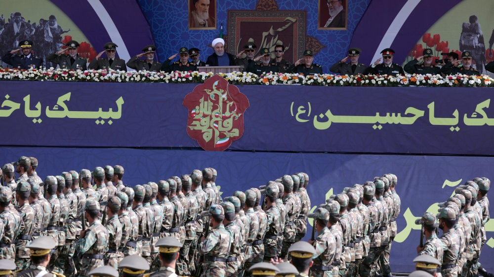 Iranian President Hassan Rouhani delivers a speech during the ceremony of the National Army Day parade in Tehran