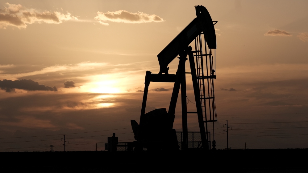 Oil pump jacks work at sunset near Midland, Texas, U.S., August 21, 2019. Picture taken August 21, 2019