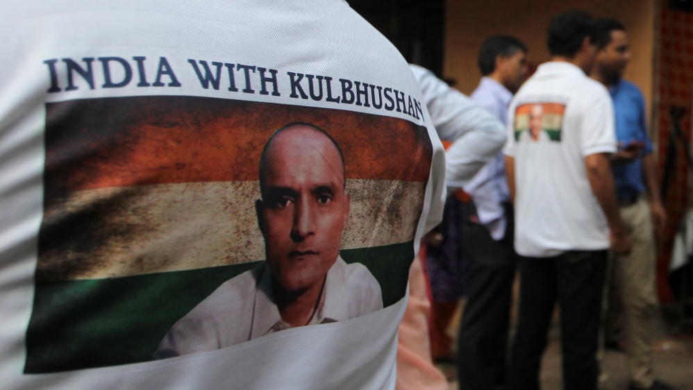 People wait before the issue of a verdict in the case of Indian national Kulbhushan Jadhav by International Court of Justice, in Mumbai