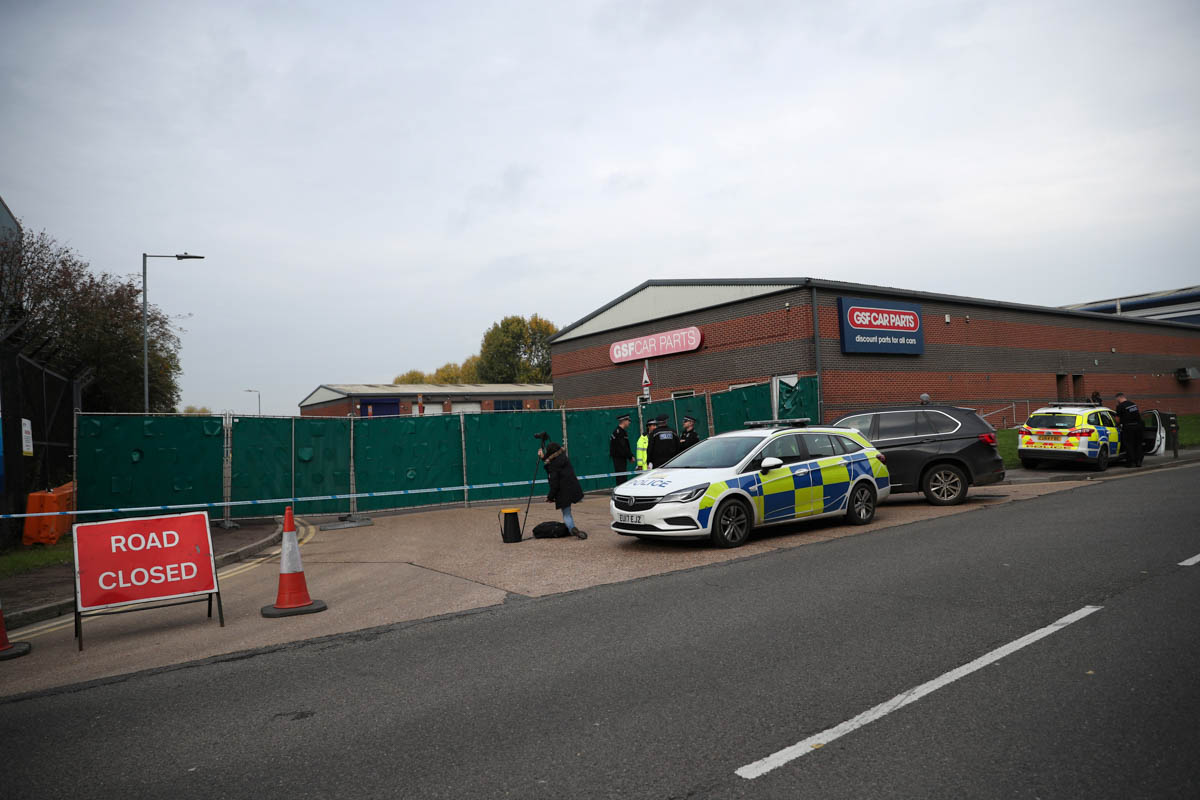 Police officers are seen at the scene where bodies were discovered in a lorry container, in Grays, Essex, Britain October 23, 2019. REUTERS/Hannah McKay