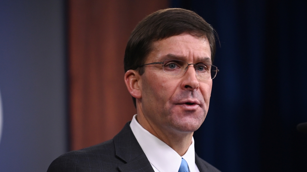U.S. Defense Secretary Esper addresses reporters at the Pentagon in Arlington