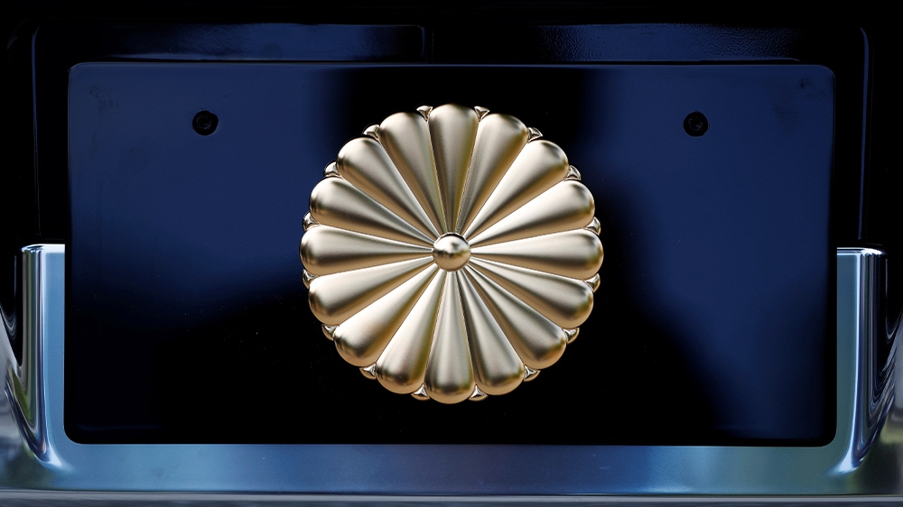 The Imperial chrysanthemum emblem is displayed on the body of a custom convertible Toyota Century. Emperor Naruhito and Empress Masako will travel in the car for a parade through the streets of Tokyo after the enthronement ceremony.