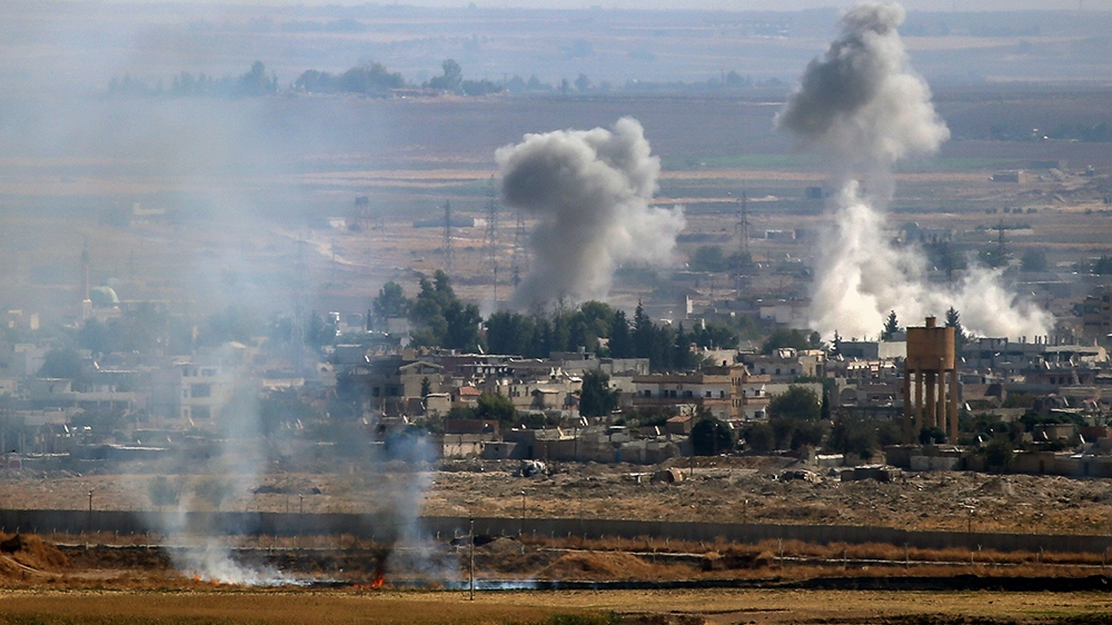 SANLIURFA, TURKEY - OCTOBER 14: A photo taken from Turkey''s Sanliurfa province, shows smoke rising after Turkish Armed Forces hit targets in Rasulayn town as part of the Turkey''s Operation Peace Sprin