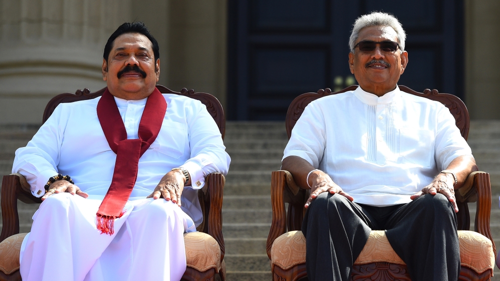 Sri Lanka''s new President Gotabaya Rajapaksa (R) and his Prime Minister brother Mahinda Rajapaksa, pose