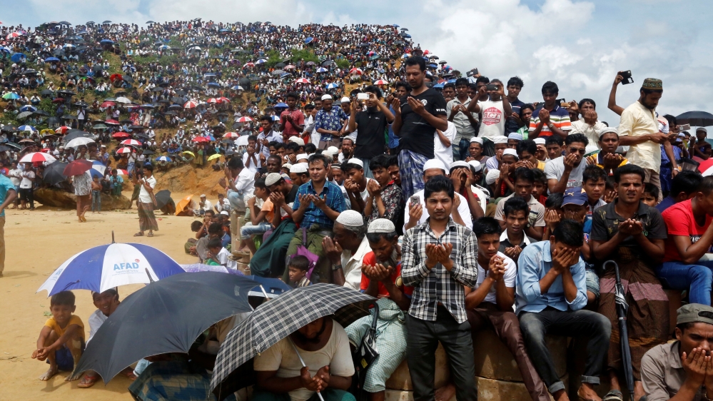 Rohingya refugees take part in a prayer as they gather to mark the second anniversary of the exodus at the Kutupalong camp in Cox’s Bazar