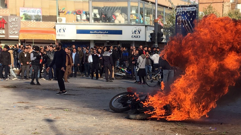 Iranian protesters clash in the streets following fuel price increase in the city of Isfahan, central Iran, 16 November 2019. Media reported that people protests in highways and in the streets after t