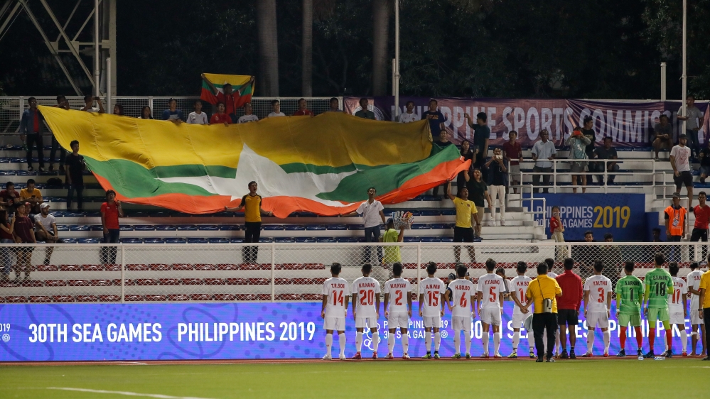 Myanmar’s football players approach their fans after winning the SEA Games 2019 men’s football first-round match against the Philippines on Wednesday