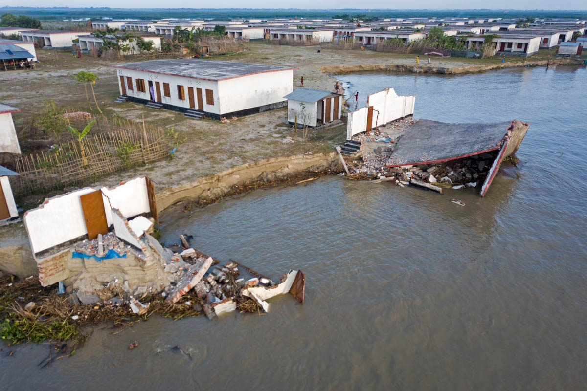 People who lost their belongings by river erosion and took shelter in shelter home now eroded again in Meghna river in Bangladesh. Sea level is projected to rise 0.4 to 1.5 meters on the Bangladesh co